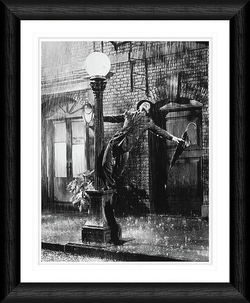 Gene Kelly Singing in the Rain Framed Print