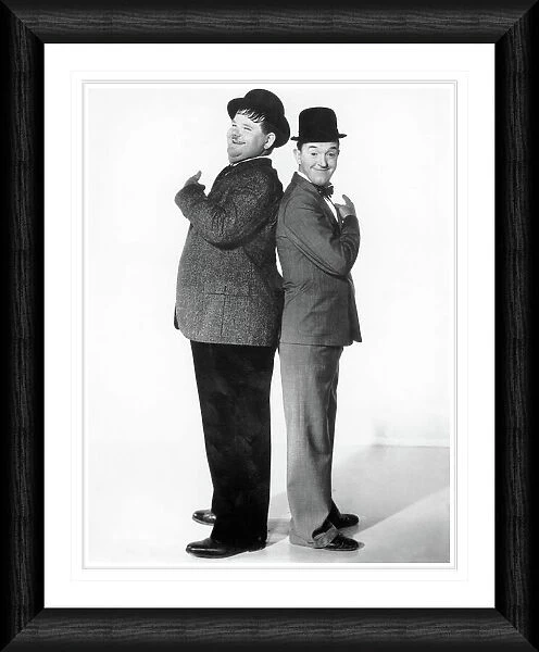 Laurel & Hardy Back to Back Framed Print