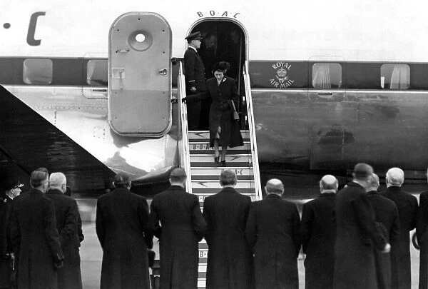 Queen Elizabeth II, Princess Elizabeth steps from her plane at London Airport after being