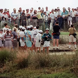 An alligator in the water as Seve Ballesteros drives off from the 9th tee in practice Ryder Cup at Kiawah Island 1991