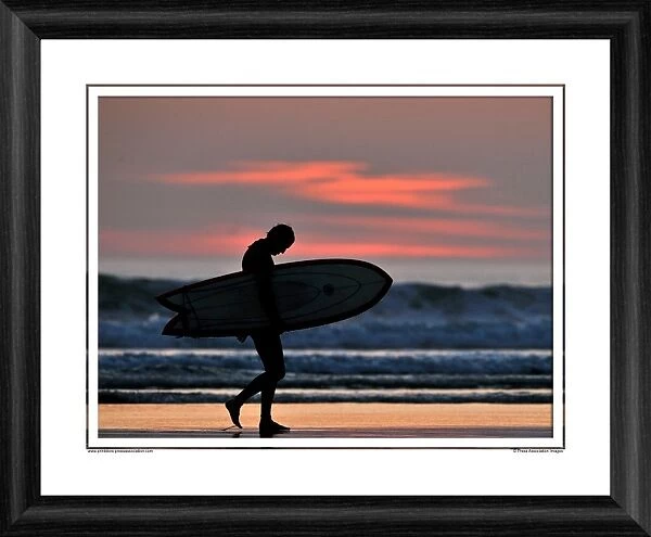A Surfer at Sunset Framed Photographic Print