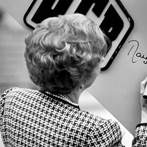 Margaret Thatcher making her signature on side of JCB - June 1987